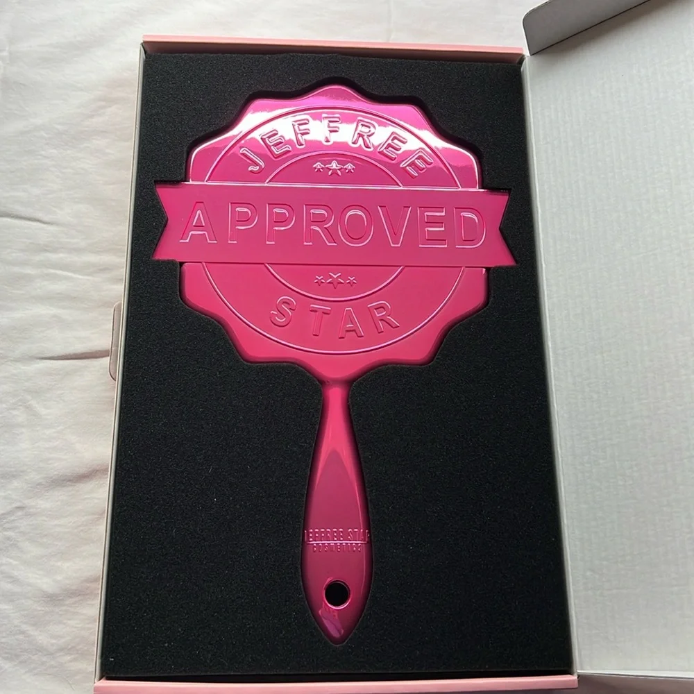 Jeffree Star Metallic Pink “Approved” stamp mirror